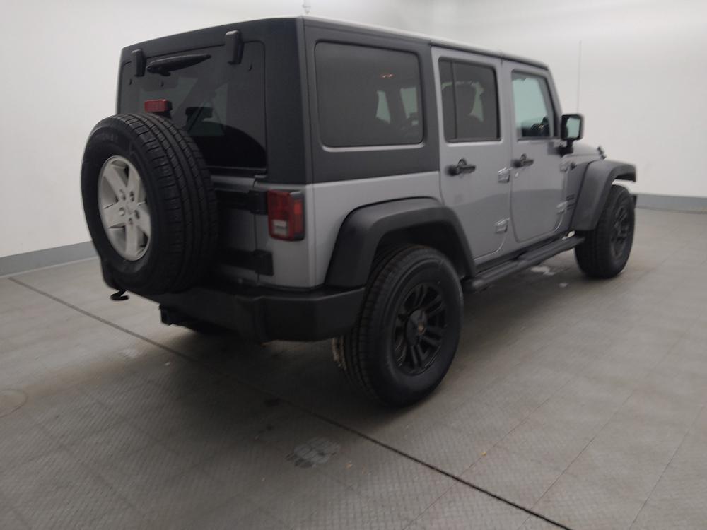 used 2013 Jeep Wrangler Unlimited car, priced at $19,395