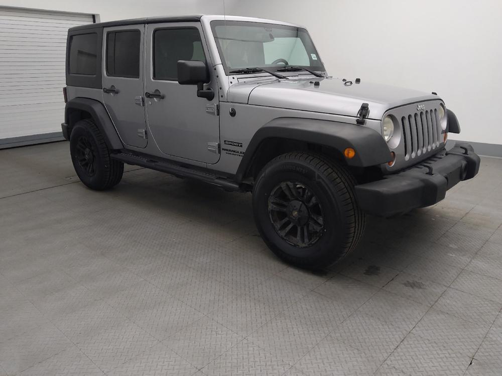 used 2013 Jeep Wrangler Unlimited car, priced at $19,395