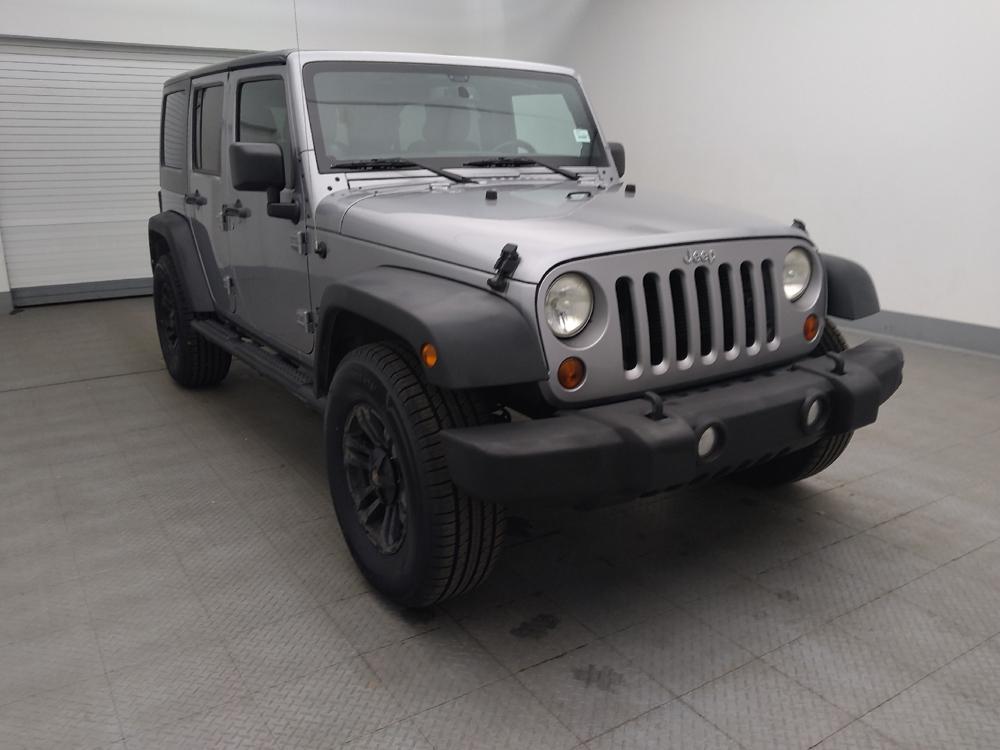 used 2013 Jeep Wrangler Unlimited car, priced at $19,395