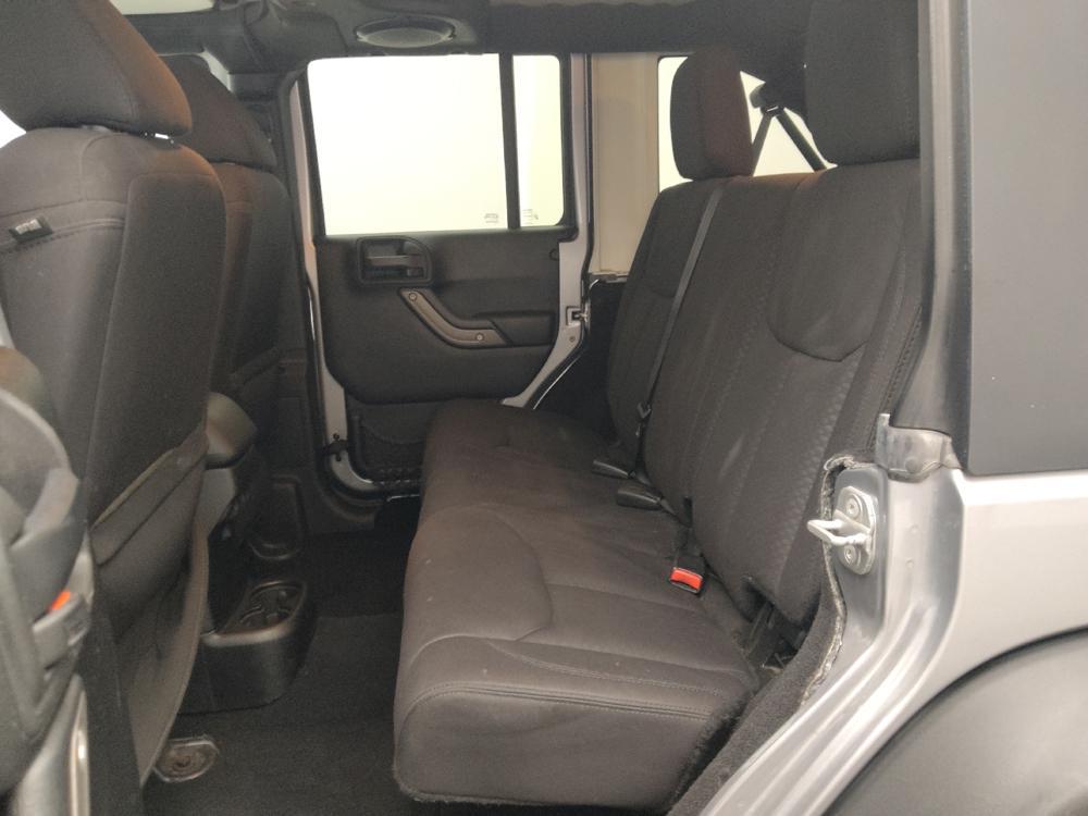 used 2013 Jeep Wrangler Unlimited car, priced at $19,395