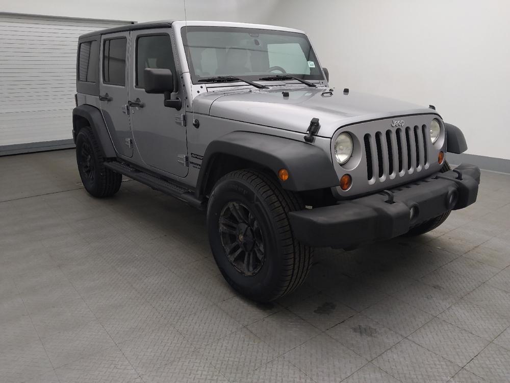 used 2013 Jeep Wrangler Unlimited car, priced at $19,395
