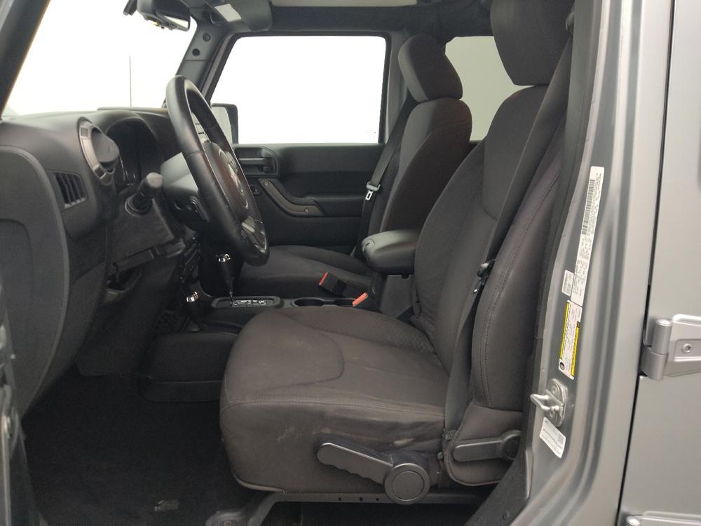 used 2013 Jeep Wrangler Unlimited car, priced at $19,395