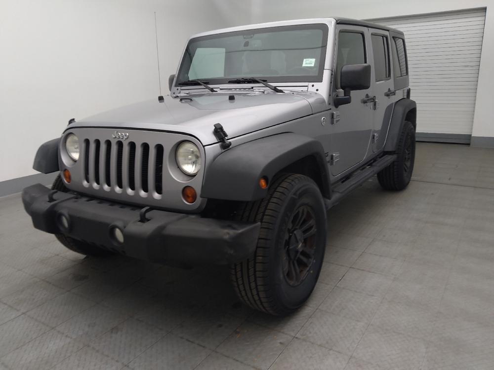 used 2013 Jeep Wrangler Unlimited car, priced at $19,395