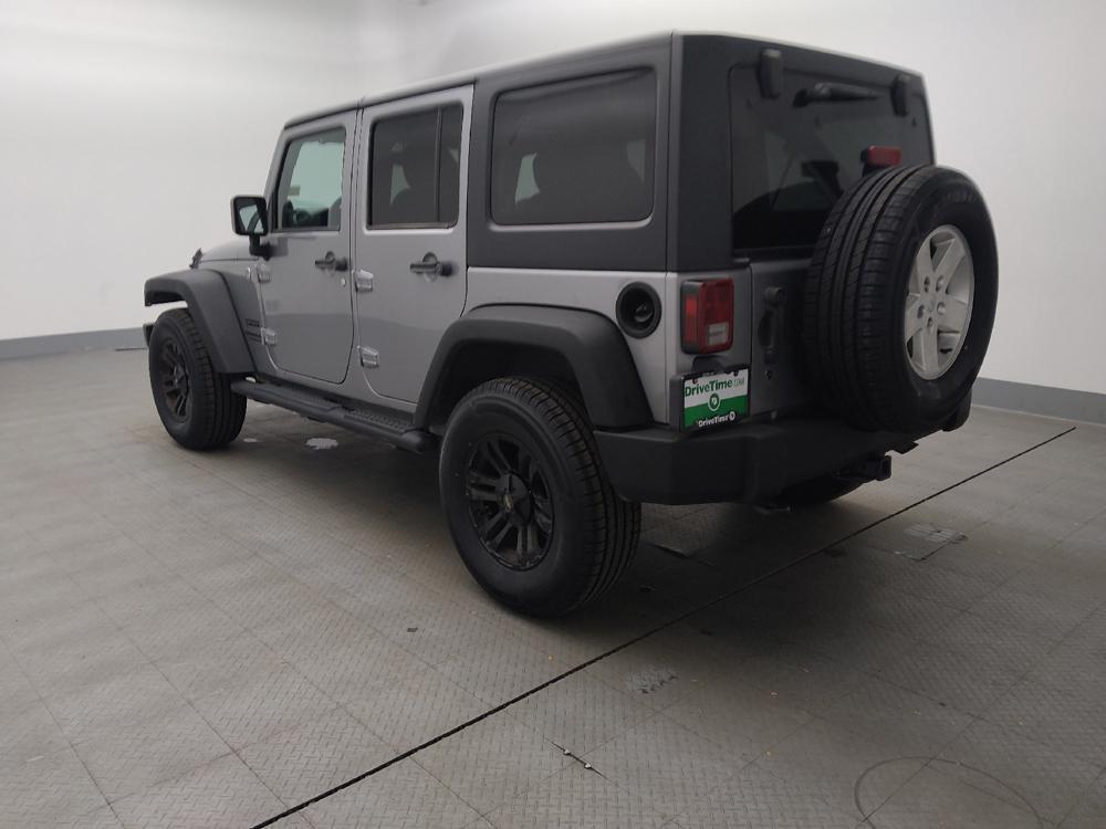 used 2013 Jeep Wrangler Unlimited car, priced at $19,395