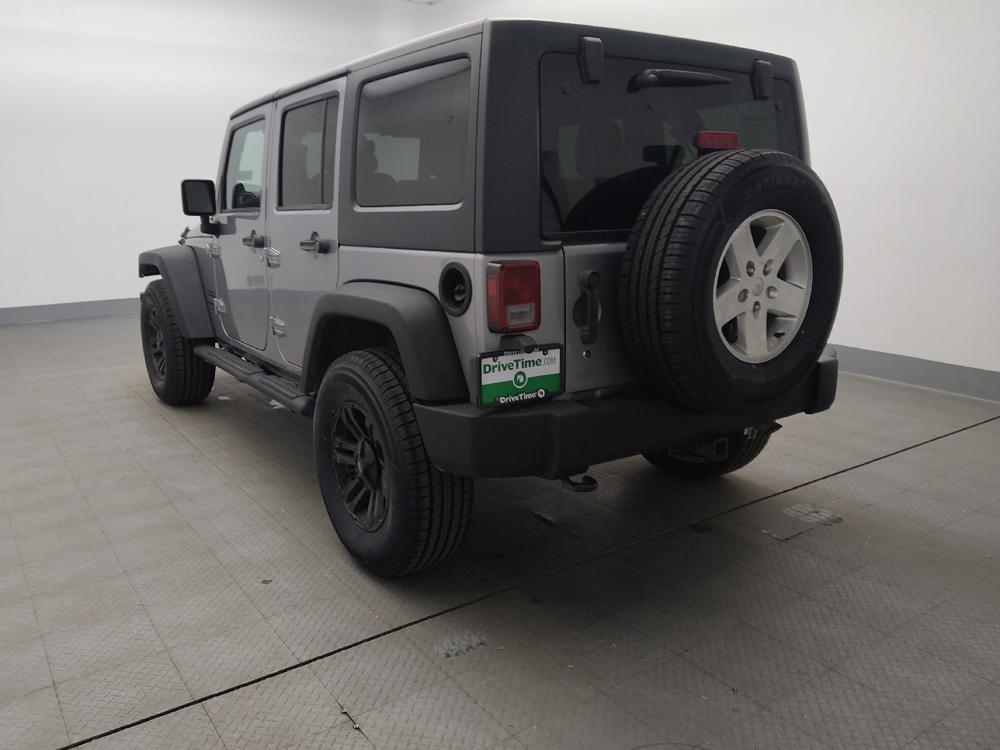 used 2013 Jeep Wrangler Unlimited car, priced at $19,395