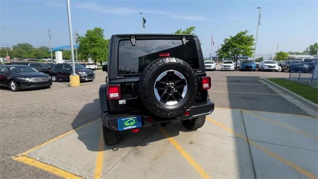 used 2021 Jeep Wrangler Unlimited car, priced at $37,427