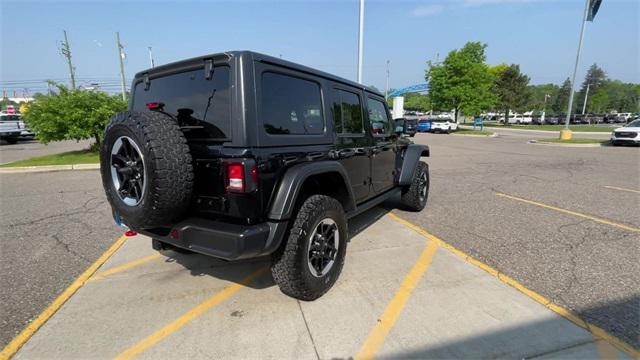 used 2021 Jeep Wrangler Unlimited car, priced at $37,427