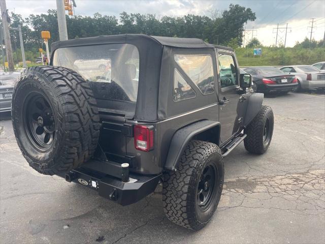 used 2016 Jeep Wrangler car, priced at $24,899