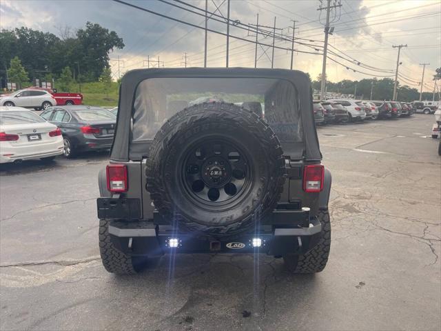 used 2016 Jeep Wrangler car, priced at $24,899