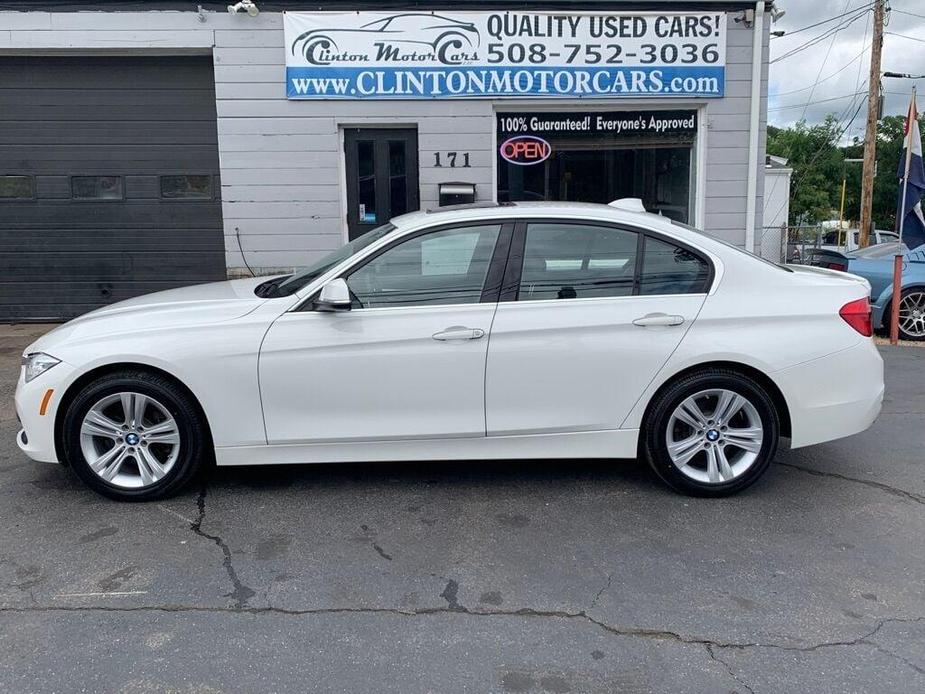 used 2018 BMW 330 car, priced at $19,386