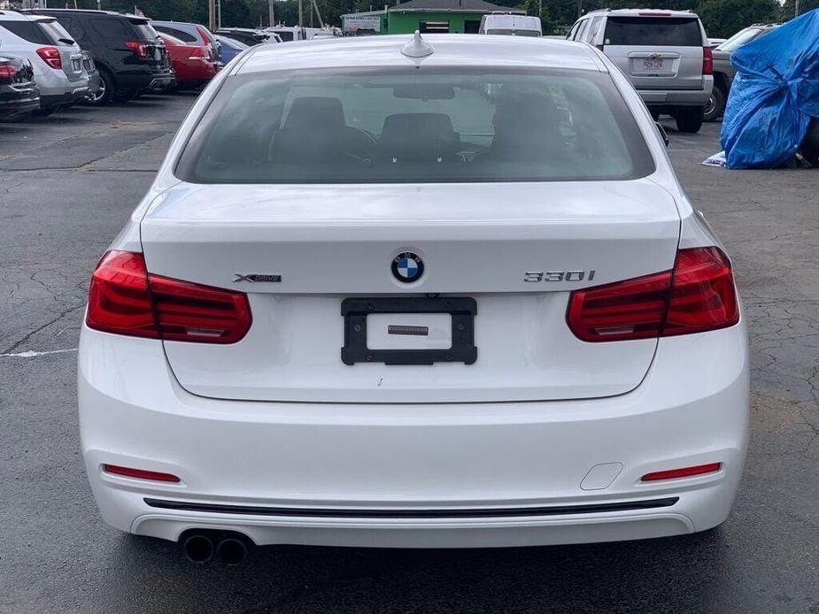 used 2018 BMW 330 car, priced at $19,386