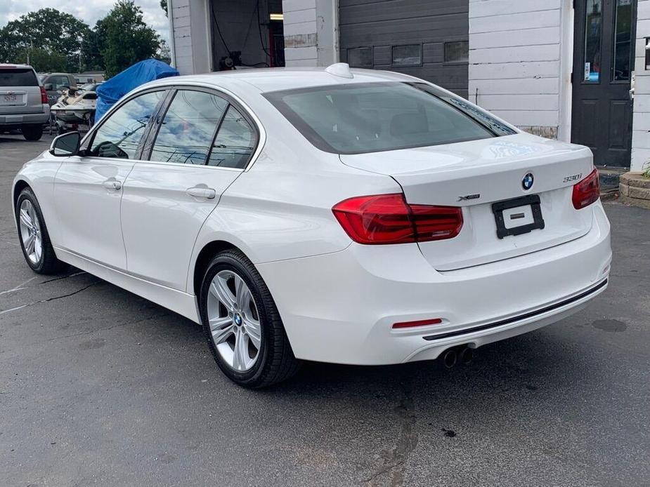 used 2018 BMW 330 car, priced at $19,386