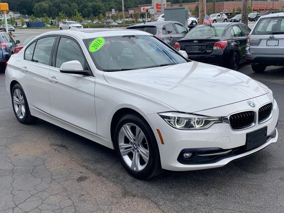 used 2018 BMW 330 car, priced at $19,386