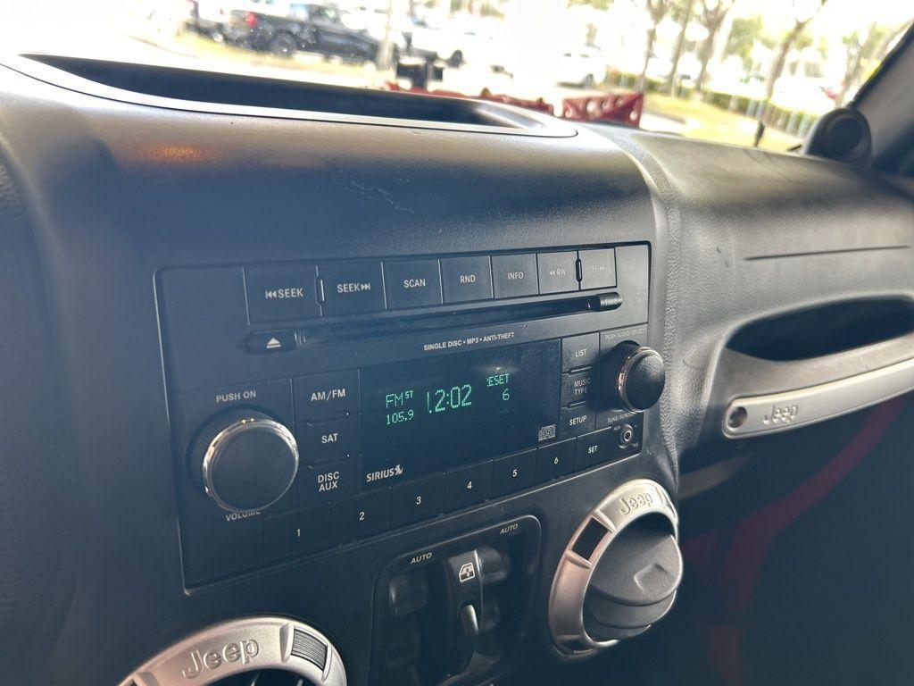 used 2014 Jeep Wrangler Unlimited car, priced at $19,618