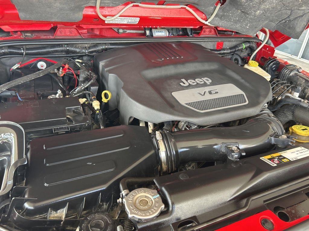 used 2014 Jeep Wrangler Unlimited car, priced at $19,618