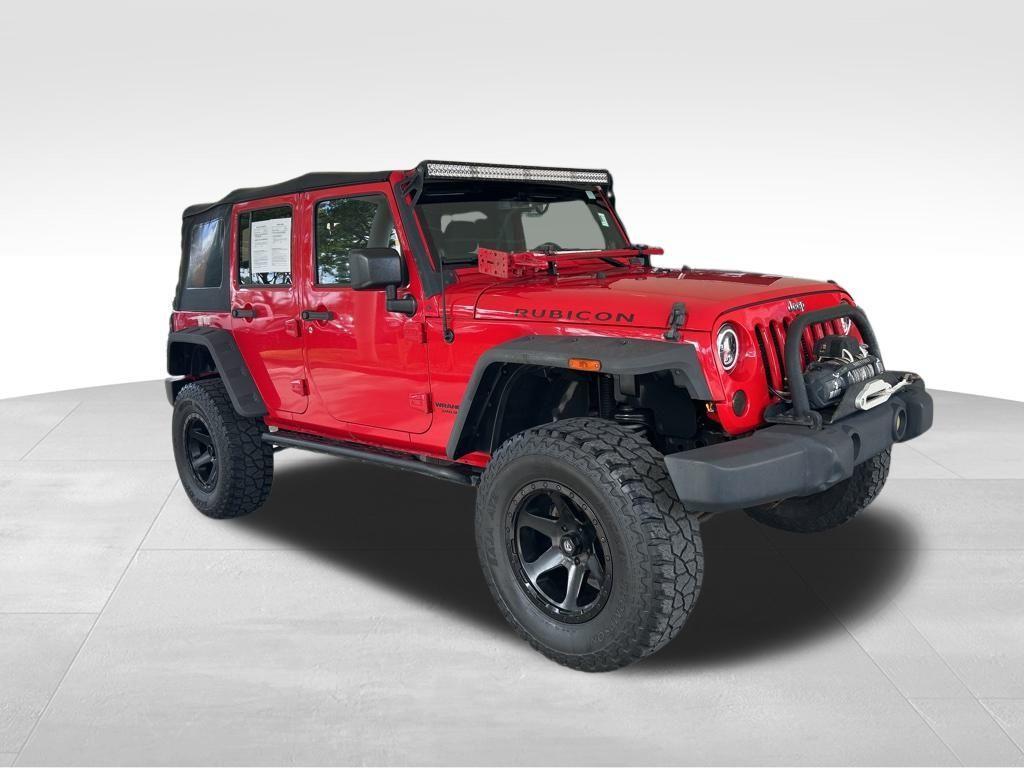 used 2014 Jeep Wrangler Unlimited car, priced at $19,618
