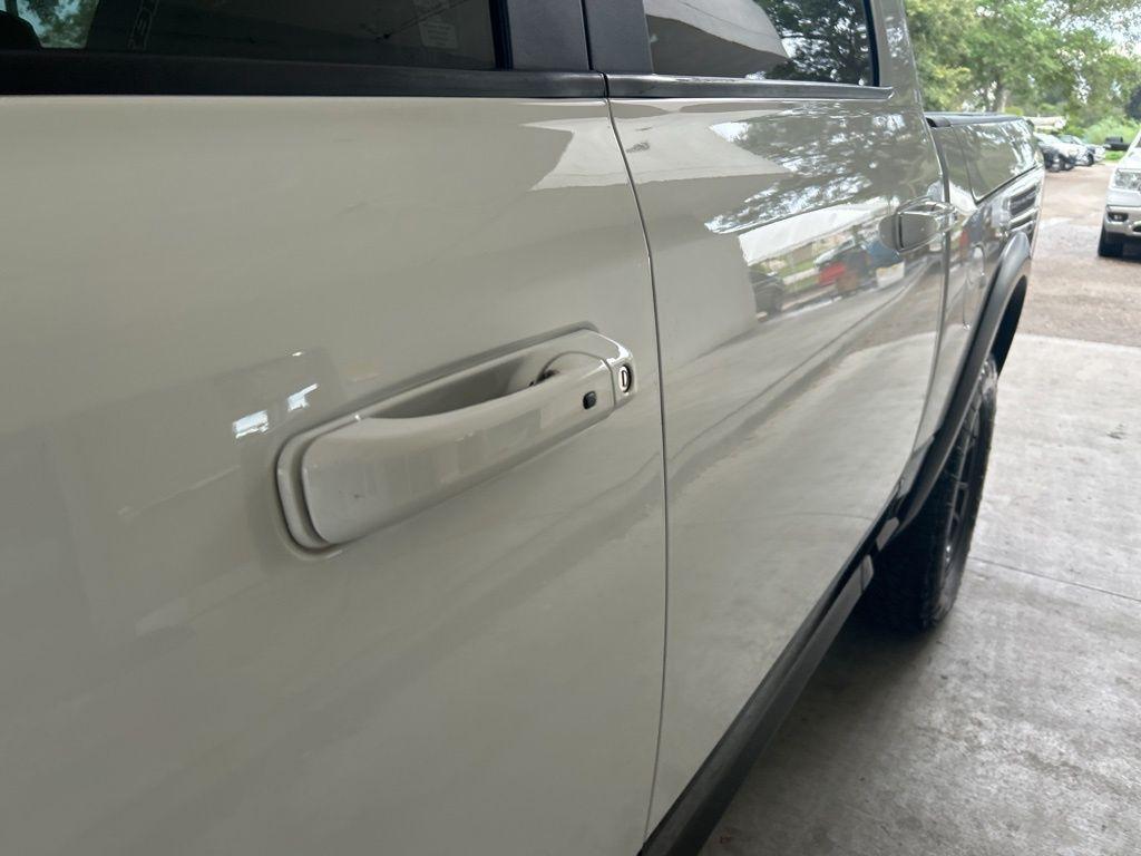 used 2018 Ram 1500 car, priced at $25,698