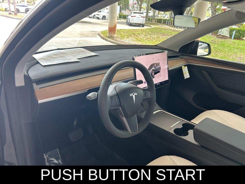 used 2024 Tesla Model Y car, priced at $35,399