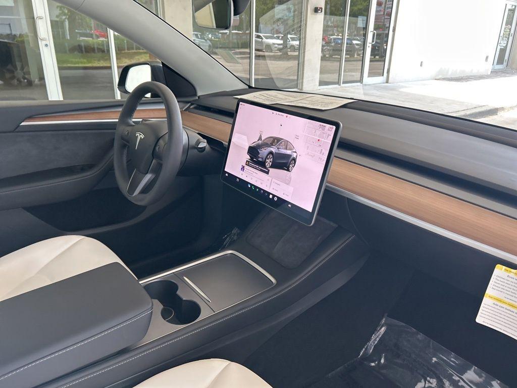 used 2024 Tesla Model Y car, priced at $35,399