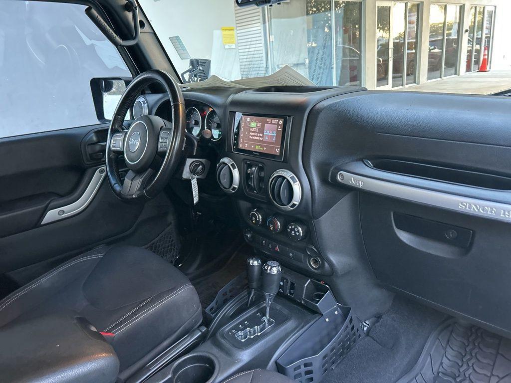used 2017 Jeep Wrangler Unlimited car, priced at $16,329
