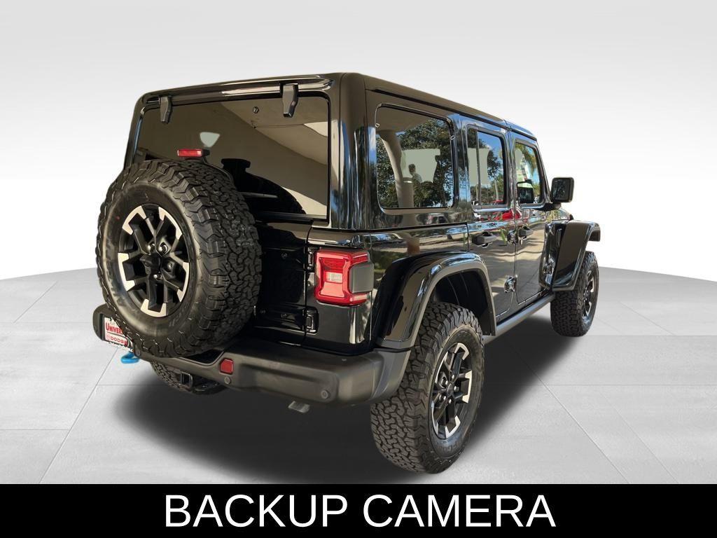 used 2024 Jeep Wrangler 4xe car, priced at $50,000