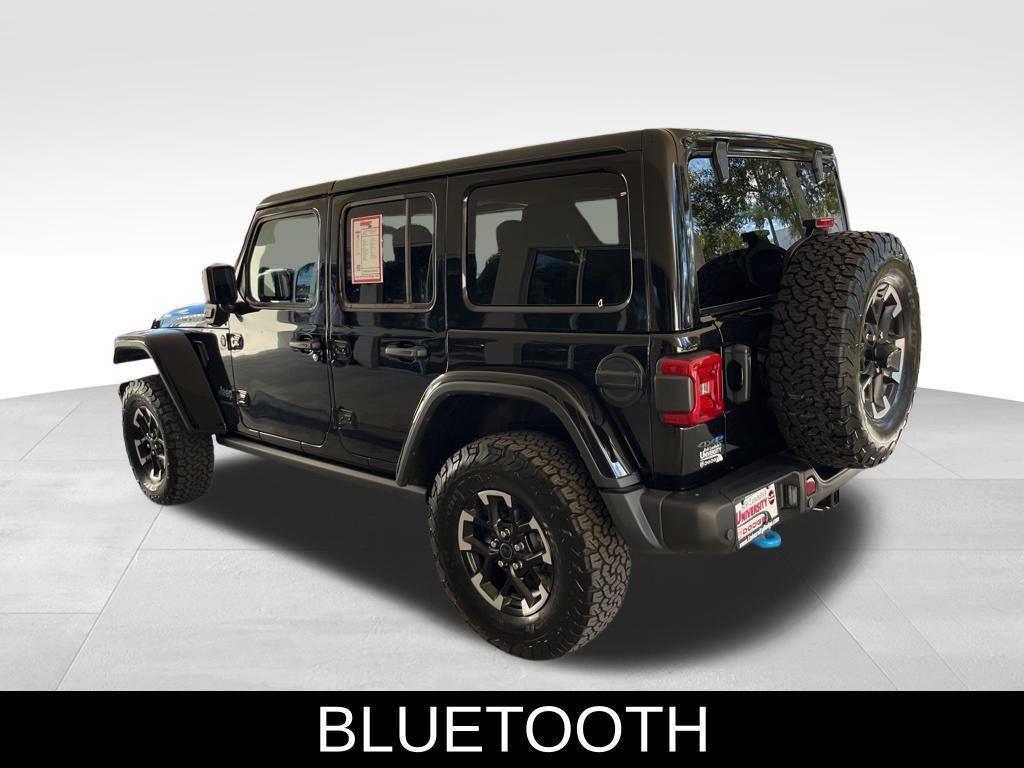 used 2024 Jeep Wrangler 4xe car, priced at $50,000