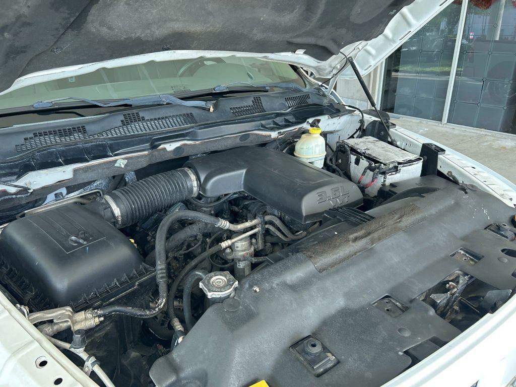 used 2014 Ram 1500 car, priced at $7,097