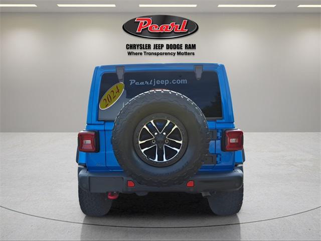 used 2024 Jeep Wrangler car, priced at $56,587