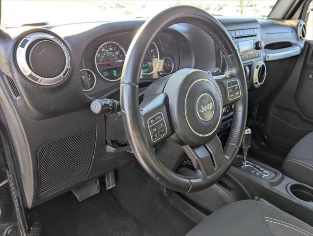 used 2015 Jeep Wrangler car, priced at $17,540