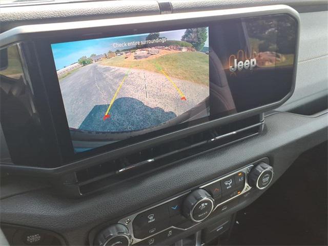 used 2024 Jeep Wrangler car, priced at $34,641