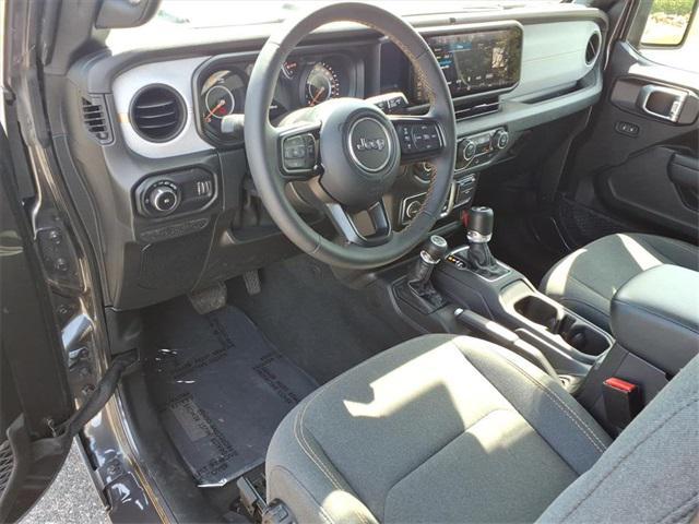 used 2024 Jeep Wrangler car, priced at $34,641