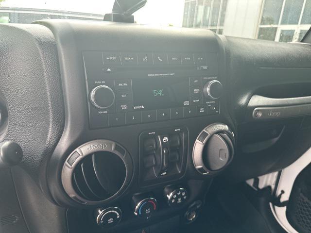used 2015 Jeep Wrangler Unlimited car, priced at $17,494