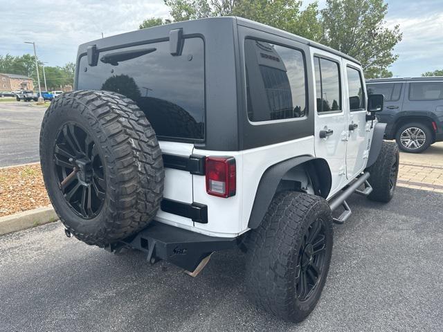 used 2015 Jeep Wrangler Unlimited car, priced at $17,494