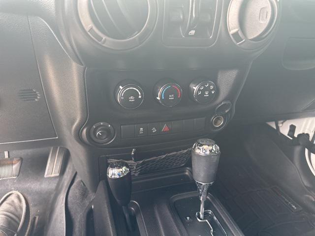 used 2015 Jeep Wrangler Unlimited car, priced at $17,494
