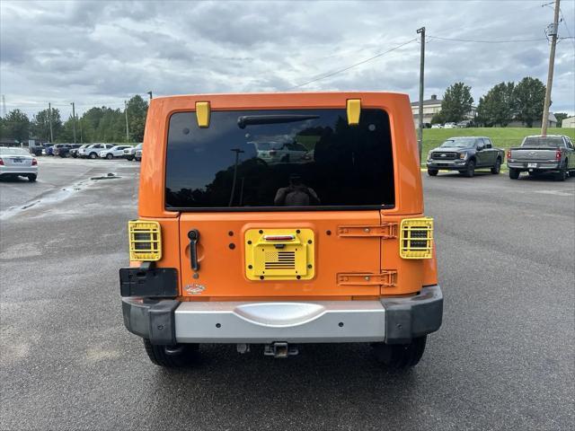 used 2012 Jeep Wrangler Unlimited car, priced at $13,788