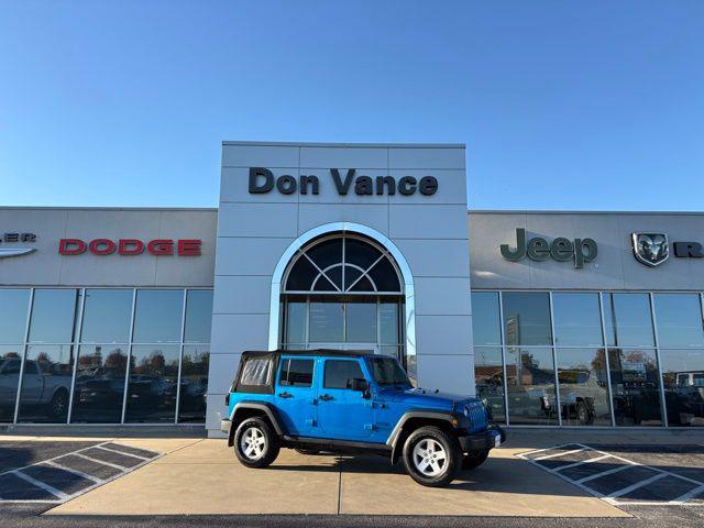 used 2015 Jeep Wrangler Unlimited car, priced at $18,413