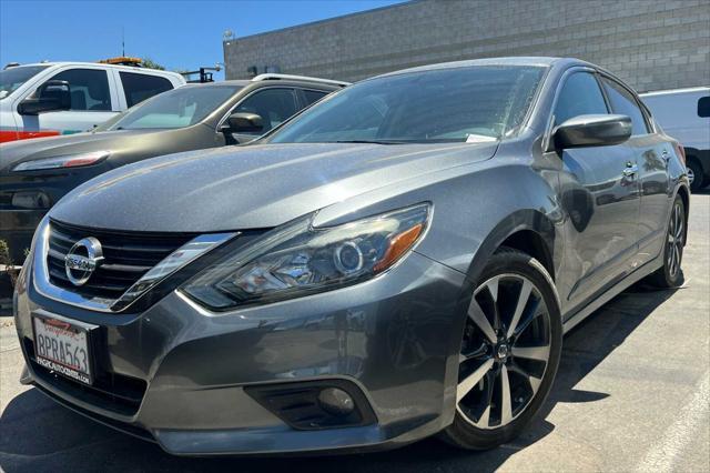 used 2017 Nissan Altima car, priced at $14,999