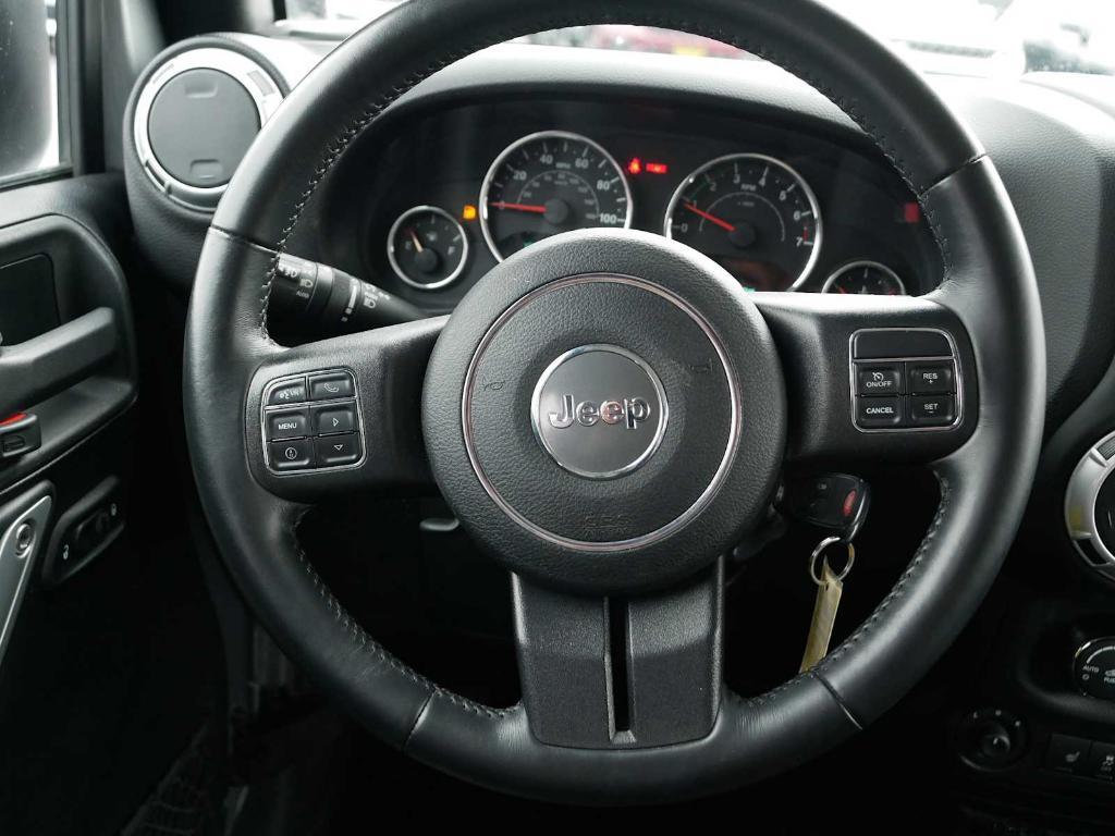 used 2015 Jeep Wrangler Unlimited car, priced at $17,893