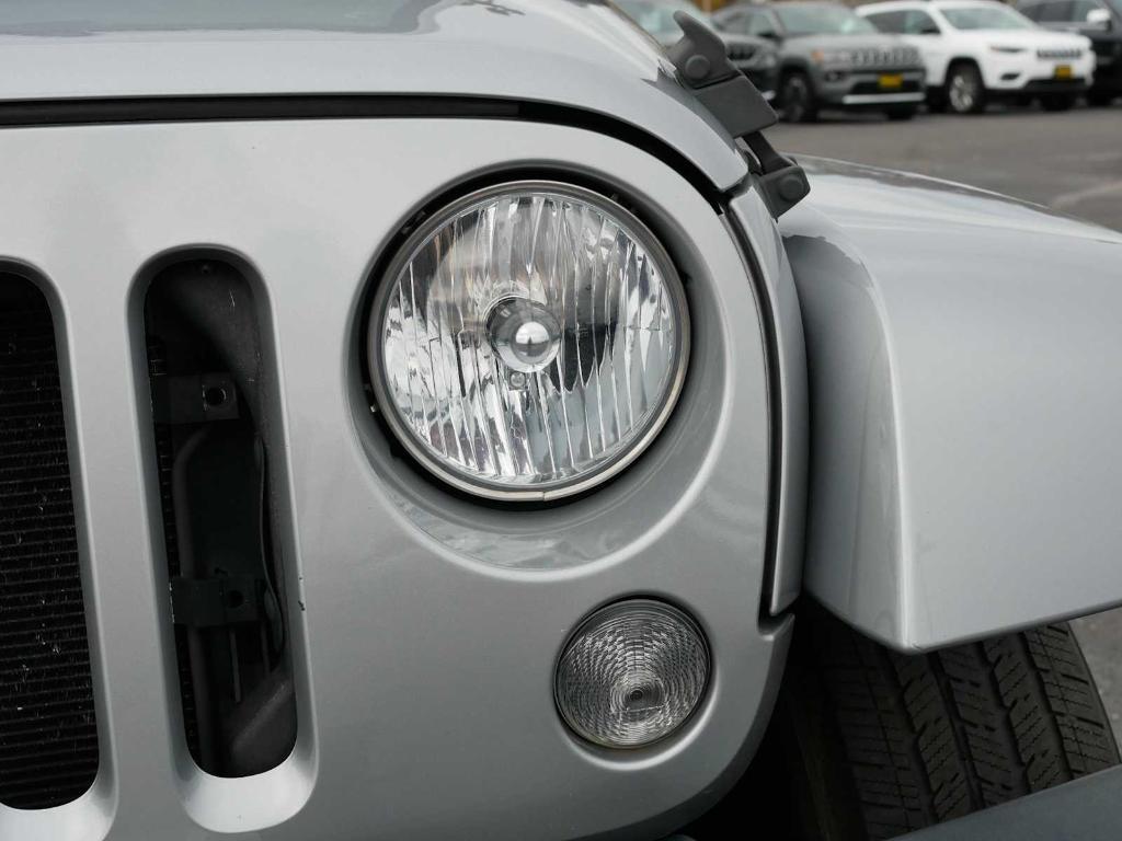 used 2015 Jeep Wrangler Unlimited car, priced at $17,893