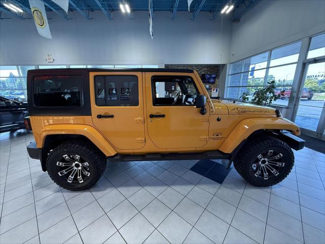 used 2012 Jeep Wrangler Unlimited car, priced at $12,961