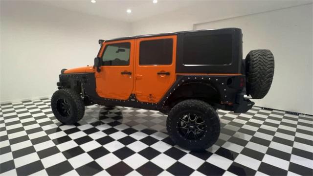 used 2012 Jeep Wrangler Unlimited car, priced at $22,390