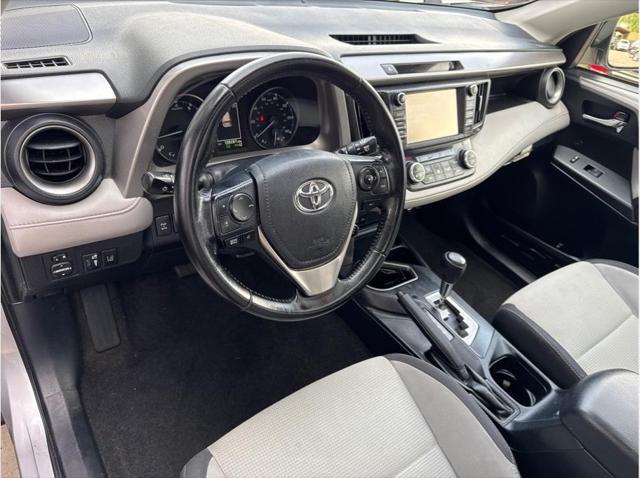 used 2018 Toyota RAV4 car, priced at $17,990