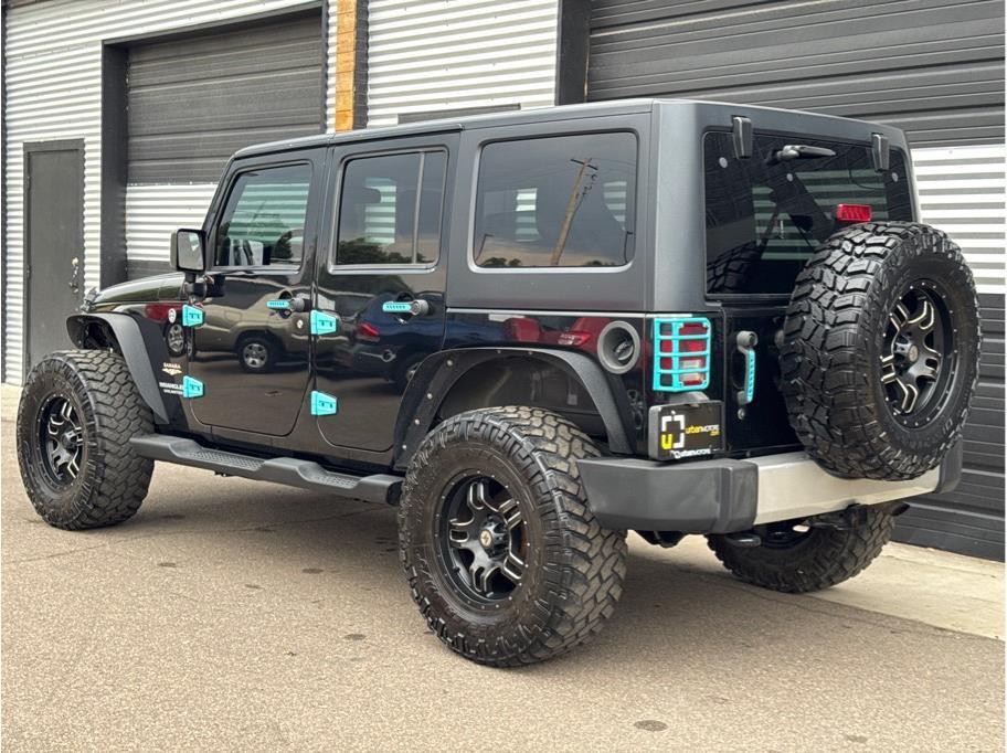 used 2013 Jeep Wrangler Unlimited car, priced at $14,990
