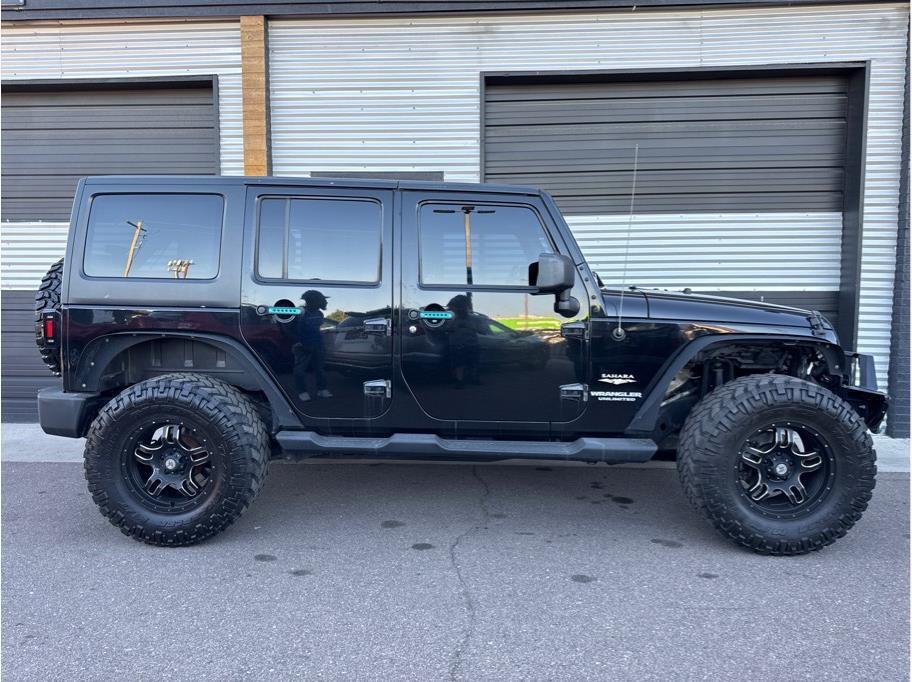 used 2013 Jeep Wrangler Unlimited car, priced at $14,990