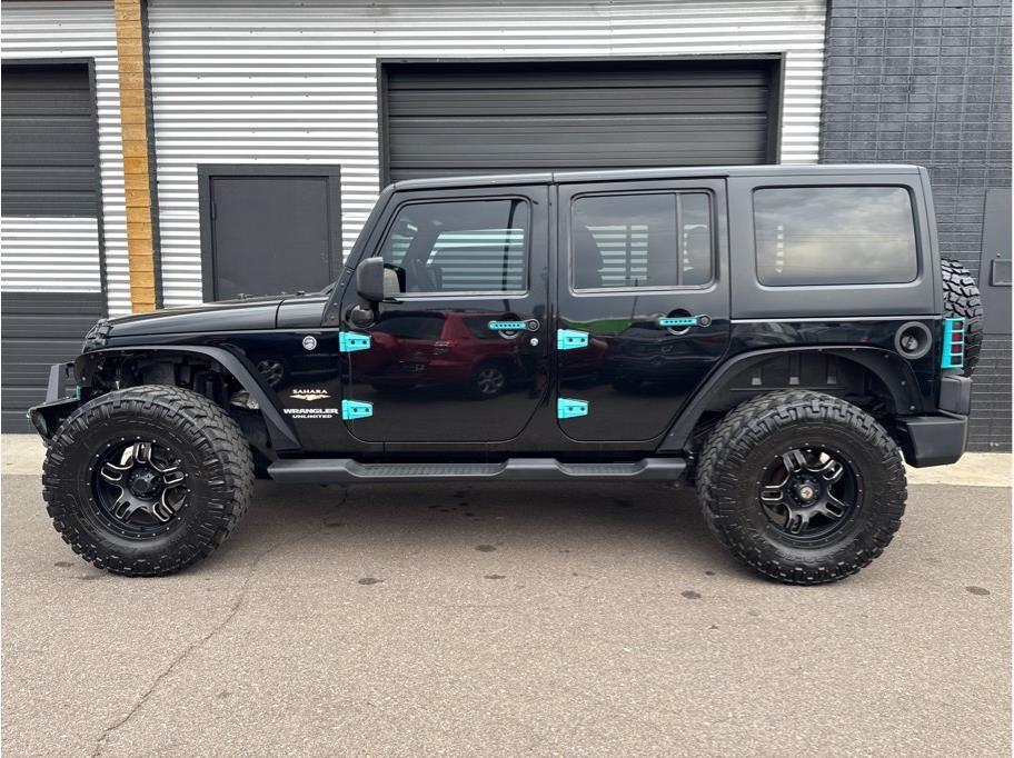 used 2013 Jeep Wrangler Unlimited car, priced at $14,990