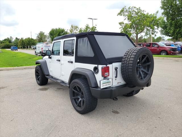 used 2011 Jeep Wrangler Unlimited car, priced at $18,428