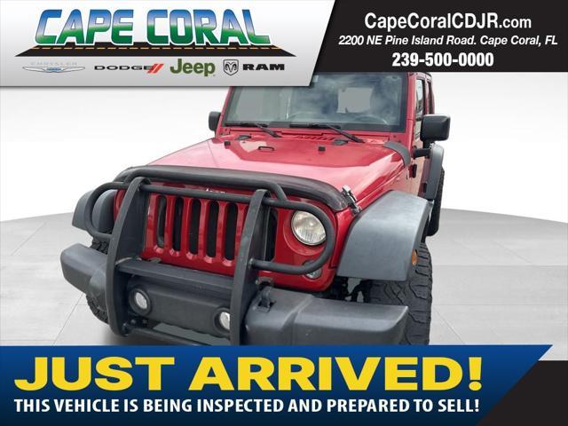 used 2014 Jeep Wrangler Unlimited car, priced at $17,985