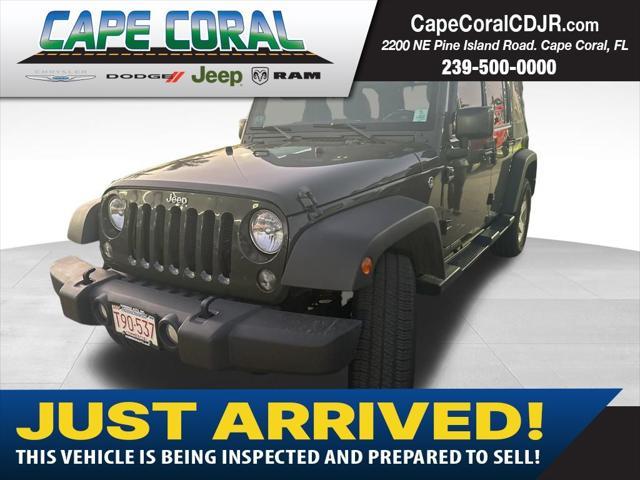 used 2016 Jeep Wrangler Unlimited car, priced at $28,297