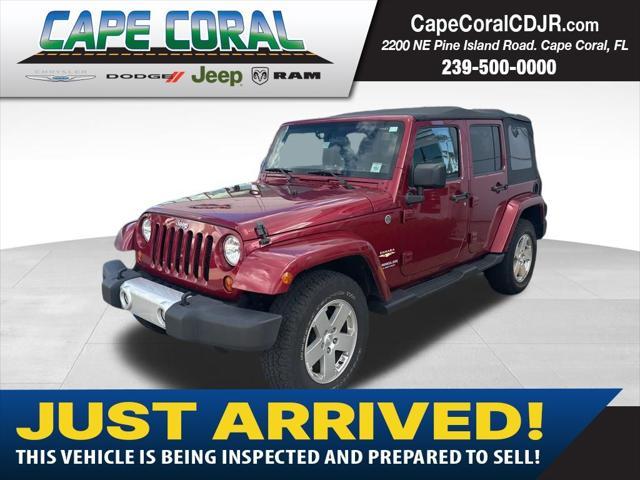 used 2012 Jeep Wrangler Unlimited car, priced at $16,585