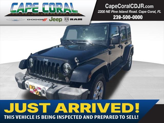 used 2013 Jeep Wrangler Unlimited car, priced at $18,997